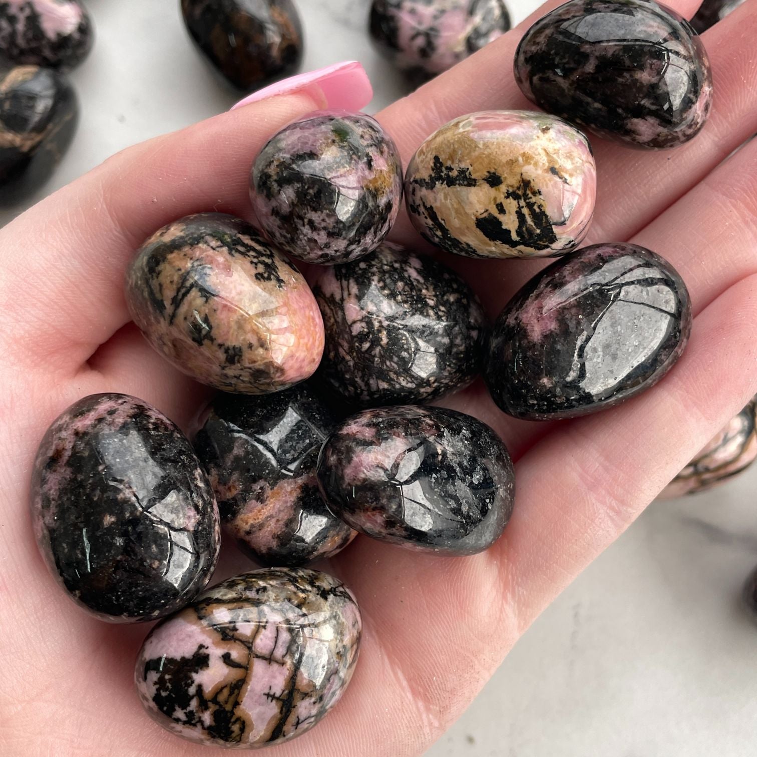 Rhodonite Tumbled - 200gms Rhodonite Tumbled - 200gms
